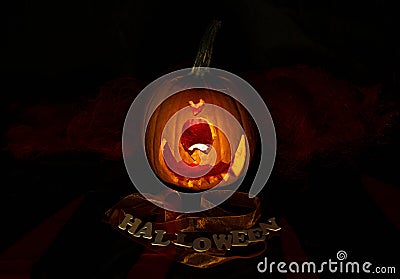 Halloween Pumpkin in dark atmosphere. Horror Cult icon. Scary face Stock Photo