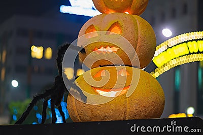 Halloween pumpkin decoration at night. Illuminated pumpkins Stock Photo