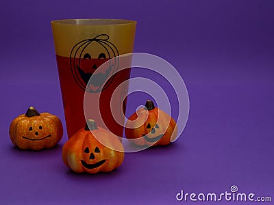 Halloween pumpkin with a glass. Stock Photo
