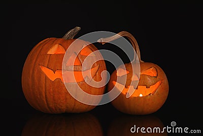 Halloween pumpkin heads. Glowing jack lanterns Stock Photo