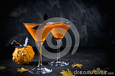 Halloween pumpkin orange cocktails. Festive drink. Halloween party. Pumpkin with holiday decorations Stock Photo