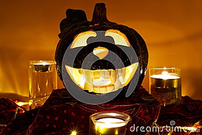 Halloween Pumpkin, scary Jack O`Lantern on orange background Stock Photo