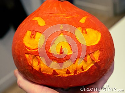 Halloween pumpkin with a scary sharp-toothed face Stock Photo