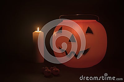 Halloween pumpkins basket and candlelight Stock Photo