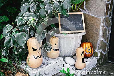 Halloween pumpkins decorated house entrance Stock Photo