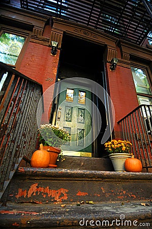 Halloween Pumpkins by doorway Stock Photo