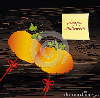 Halloween. Pumpkins on a sticks with a bows. Vector on wooden ba Stock Photo
