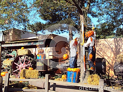 Halloween pumpkins working in Disneyland Paris Editorial Stock Photo