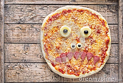 Halloween scary food funny monster zombie face pizza horror snack Stock Photo