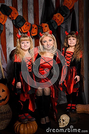 Halloween scene with three attractive witches Stock Photo