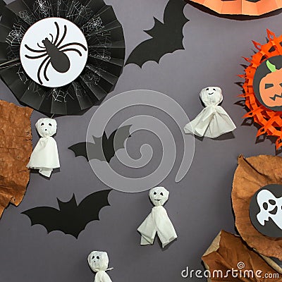 Halloween seamless pattern. Pumkins and bats on an orange background. Scary endless pattern for fabric, paper. Stock Photo