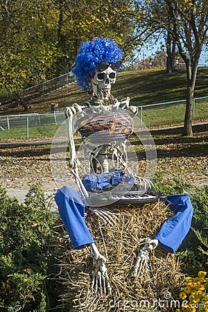 Halloween skeleton with a blue wig Stock Photo