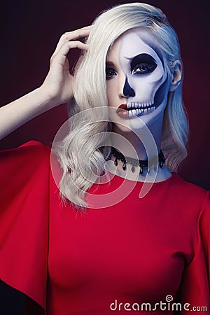 Halloween skull make-up beautiful woman Stock Photo