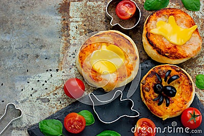 Halloween snack cheese olives spider mini pizza, creative food i Stock Photo