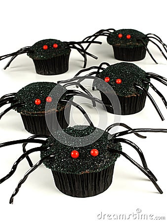 Halloween spider cupcakes over white Stock Photo