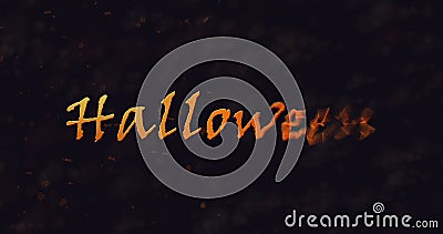 Halloween text dissolving into dust to right Stock Photo