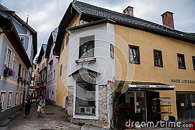Hallstatt, Austria, 27 August 2021: Colorful scenic picturesque town street at summer day, mountain village near lake and Alps, Editorial Stock Photo