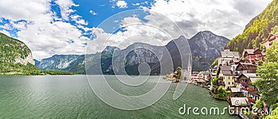 Hallstatt panorama. Clouds and Alps lake and mountain Stock Photo