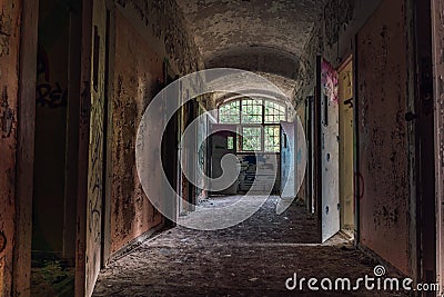 Hallway from an abandoned mental institution Stock Photo