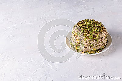 Halva with pistachios on white background with copy space Stock Photo