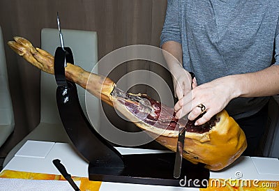 Ham hand slicing hamon food Stock Photo