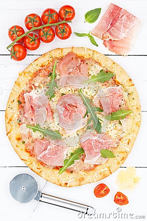 Ham pizza prosciutto from above portrait format baking ingredients on wooden board Stock Photo