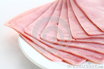 Ham on white dish Stock Photo