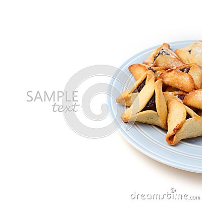 Hamantaschen cookies on plate on white background Stock Photo