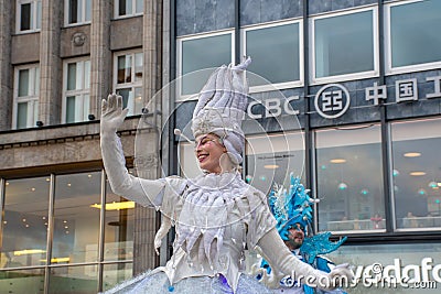 Young woman waving in Hamburg Christmas parade Editorial Stock Photo