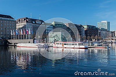 Boats on Binnenalster lake with blue sky Editorial Stock Photo