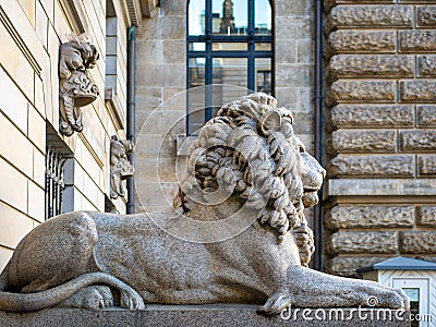 Hamburg, Germany - July 03, 2018: View at Lion sculpture at entrance to courtyard at Townhall Hamburg. Editorial Stock Photo