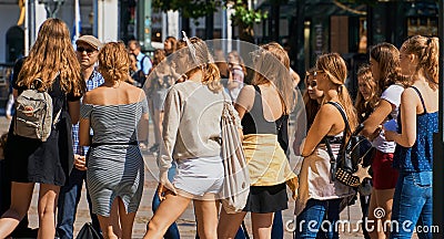 Young blonde girls on a guided tour through a German city Editorial Stock Photo