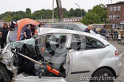 Open day demonstration of emergency rescuing people from damaged cars during traffic accidents Editorial Stock Photo