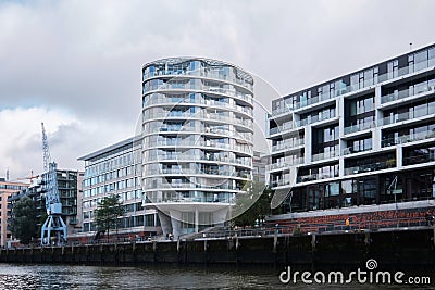 Oval shaped residential tower Oval Am Kaiserkai 10 in Hafencity Editorial Stock Photo