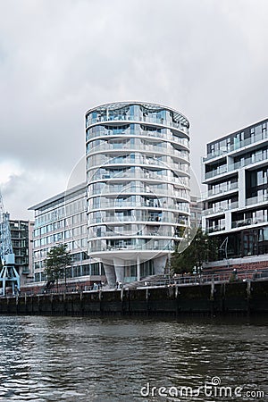 Oval shaped residential tower Oval Am Kaiserkai 10 in Hafencity Editorial Stock Photo