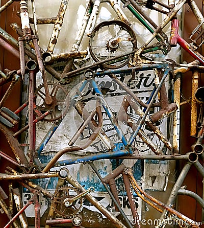 Street art, bicycle scrap, rusted parts of old bicycles Editorial Stock Photo