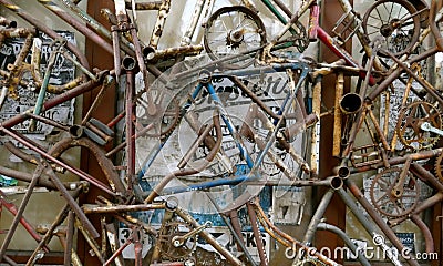 Street art, bicycle scrap, rusted parts of old bicycles Editorial Stock Photo