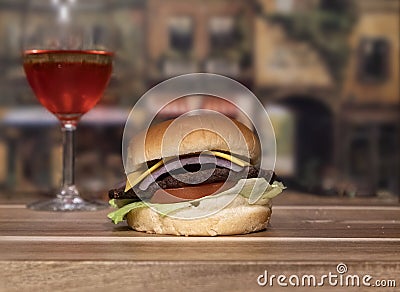 Hamburger and wine for a noon time meal. Stock Photo