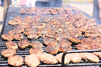 Hamburgers on barbeque Stock Photo