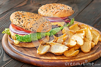Hamburgers with potato dippers Stock Photo