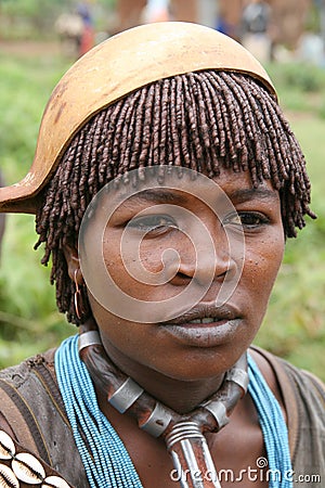 Hamer girl from Turmi with a squash hat, Ethiopia Editorial Stock Photo