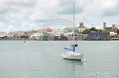 Hamilton, Bermuda - July 10, 2014: Hamilton Cargo Docks with stacked containers waterside. Editorial Stock Photo