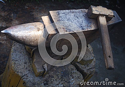 Hammer and anvil Stock Photo