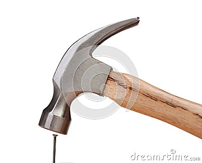 Hammer hitting a nail Stock Photo
