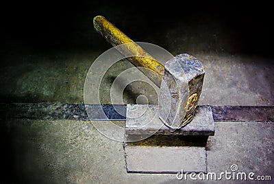 Hammer on iron anvil Stock Photo