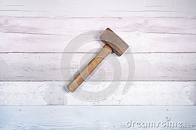 Hammer mason or mass on a background of old boards. Top view Stock Photo