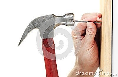 Hammer nail hit Stock Photo