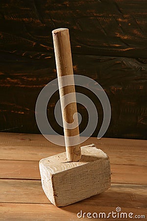 Hammer old wooden made over wood Stock Photo