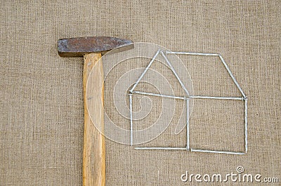 Hammer and outbuilding form of nail linen texture Stock Photo