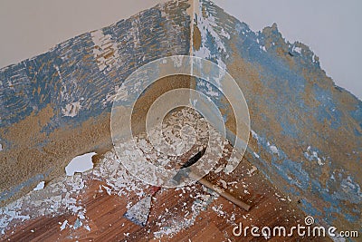 Hammer and scraper tools removing paint Stock Photo